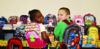 Owens alumni, area businesses partner for school supply drive